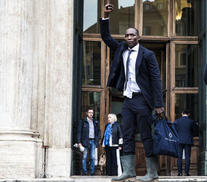 42-Year-Old Immigrant Storms Italian Parliament in Rain Boots